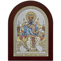 Icoana de Argint Sfantul Spiridon 15x21cm ColorSfantul Spiridon a participat la primul sinod ecumenic de la Niceea din anul 325 si este renumit prin analogia pe care a facut-o in legatura cu Sfanta Treime a dat ca exemplu o caramida ce este formata din trei elemente pamant foc si apa In timp ce vorbea s-a intamplat o minune s-a aprins focul in partea de sus a mainii iar in jos a curs apa Numeroase alte minuni ii sunt atribuite a adus ploaie in vreme de seceta a dat viata 