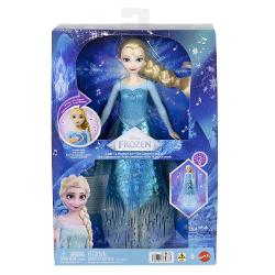Papusa Elsa din Disney Frozen aduce magia Regatului de Gheata intr-o versiune interactiva cu muzica si efecte luminoase Prin apasarea zonei indicate pe piept papusa activeaza o melodie si lumini care pun in valoare tinuta inspirata de personajul Elsa Papusa poarta o rochie eleganta in nuante de albastru cu detalii stralucitoare si motive inspirate de gheata si fulgi de zapada Parul blond impletit lateral completeaza aspectul emblematic al personajului Este potrivita pentru recrearea 