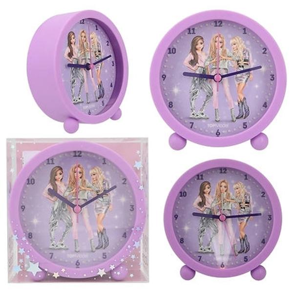 E timpul pentru glamour TOP MODEL Acest ceas cu alarma rotund violet are trei TOP MODEL elegante si pietre mici stralucitoare pe cadran Cu efect luminos si maini linistite Baterie 1x AA 15V inclusa si inlocuibila