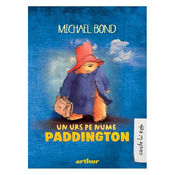 Paddington este în Marea Britanie o adevrat instituieO zi cald de var pe peronul unei gri lume mult glgie i un col întunecat Acolo st cuminte pe o valiz un urs cu ochi rotunzi acoperii de o plrie cu boruri largi De unde vine i ce caut în gara Paddington vei afla cltorind cu noi în lumea plin de aventuri a misteriosului urs Doamna i domnul Brown l-au întâlnit pe 