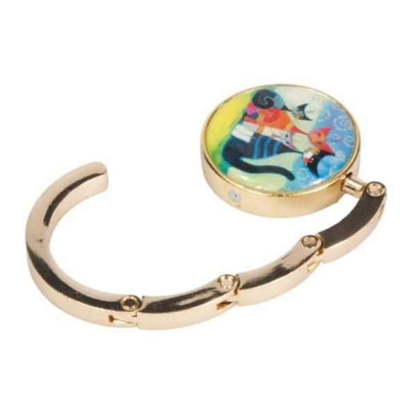 Inel prindere sacosaInel decorativ pentru ag&259;&539;area gen&539;ii de marginea mesei Design ilustrat de Rosina WachtmeisterUn accesoriu mic dar extrem de practic &mdash; inelul pentru saco&537;&259; &icirc;&539;i permite s&259;-&539;i ag&259;&539;i geanta de marginea mesei f&259;r&259; s&259; o pui pe jos Util la restaurant la birou sau &icirc;n orice situa&539;ie &icirc;n care ai nevoie de o solu&539;ie rapid&259; &537;i 