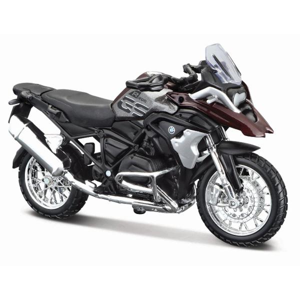 Traieste experienta supersport la scara redusa cu aceasta motocicleta in miniatura BMW R1200 parte din gama exclusivista Maisto Special Edition Reprodusa la scara 118 aceasta replica surprinde perfect spiritul unei legende pe doua roti recunoscuta pentru viteza agilitate si designul agresiv Construita din metal turnat die-cast cu elemente din plastic de calitate motocicleta impresioneaza prin atentia la detalii carenaj aerodinamic motor fin conturat suspensii realiste si evacuare 