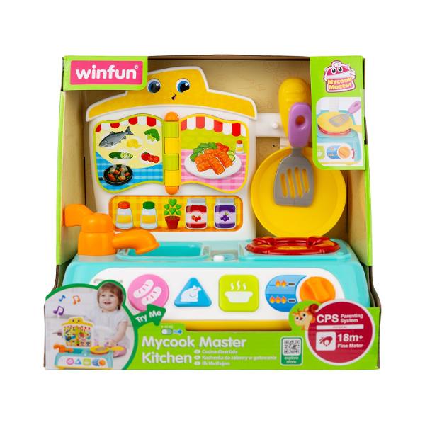Jucarie Bucatarie Interactiva este un centru de joaca pentru micii bucatari conceput pentru jocuri de rol si activitati interactive Jucaria include o carte cu retete si ustensile pentru gatit astfel incat copilul poate imita pregatirea diferitelor preparate Rotirea butonului de temperatura activeaza o lumina intermitenta iar cele 3 butoane interactive ajuta la descoperirea diferitelor forme si alimente Robinetul poate fi rotit pentru a reda sunete realiste de apa iar bucataria include si 
