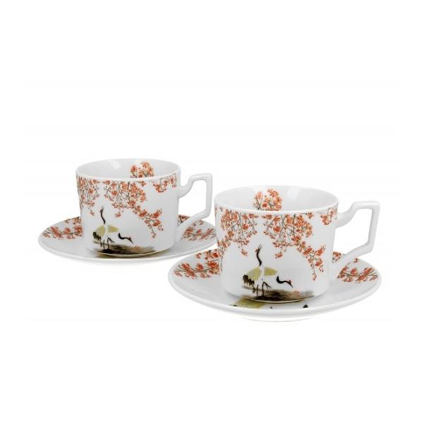 Un set de doua cesti de lux cu farfurioare SAKURA AND CRANES  parte din seria Japan Collection  realizate din portelan New Bone China caracterizate printr-o culoare alb-crem eleganta si naturala cu o stralucire delicata precum si o durabilitate exceptionalaLinia este decorat&259; cu un motiv cu cocori japonezi care î&537;i ridic&259; gra&539;ios gâturile spre ramurile de cire&537; 