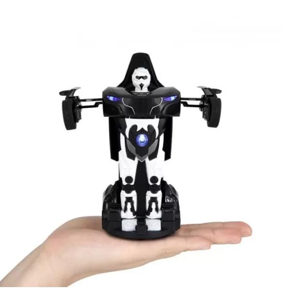 Masinuta RS Transformable este gata de a iesi din cutie Poate fi masinuta sau robot Efecte luminoase si sunete in timpul miscariiMasinuta are proportiile ideale pentru momente pline de distractie si amuzament avand dimensiunile in centimetri dupa cum urmeaza  13595155cm Masinuta metalica RS scara 1 la 32 are anvelope de cauciuc si un design detaliat interior-exterior realizat din material metalic turnat cu accesorii realizate din material plastic portiere de calitate superioara 