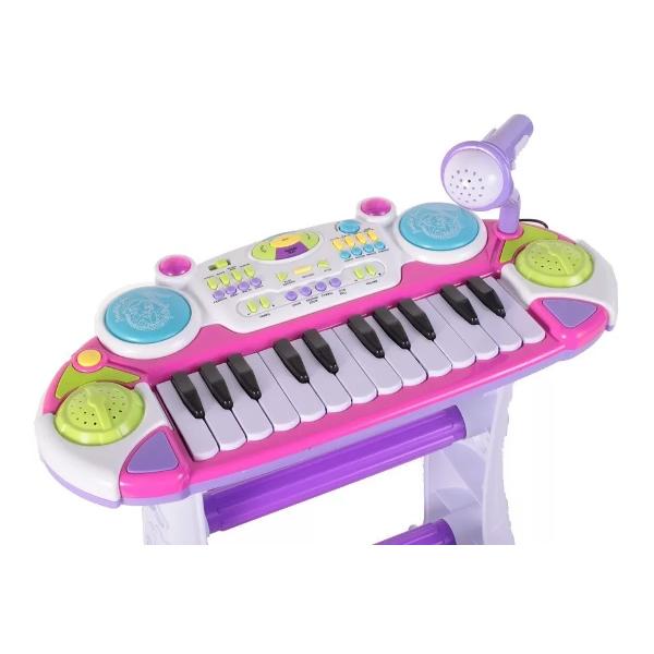 Pianina electronica MalPlay cu scaun si microfon 45 cm inaltime Roz Copii adora sa cante la instrumente muzicale iar orga muzicala pentru baieti este creata special pentru a ajuta copii sa isi experime emotiile Oraga ii va permite copilului tau sa-si dezvolte pasiune pentru arta muzica si abilitati muzicale Aceasta orga cuprinde o gama larga de sunete 8 ritmuri muzicale si 8 sunete de intrumente 14 clape inregistreaza sunete are posibilitatea de a schimba ritmul lent- rapid doua 