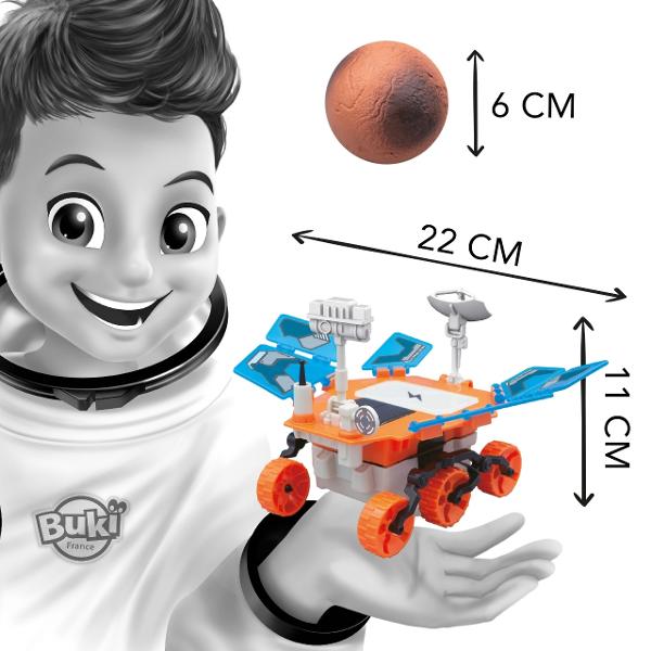  Asambleaza un vehicul care se va putea alimenta cu energie solara Robotelul poate functiona si cu o baterie LR06-AA neinclusa astfel incat sa te poti juca chiar si fara lumina soarelui Exploreaza mai departe excavand un bloc de ipsos pentru a descoperi patru roci autentice- andezit magnetit hematit si olivina - similare cu mineralele gasite pe marte de roverele stiintifice Dimensiunile rover-ului asamblat 22514 