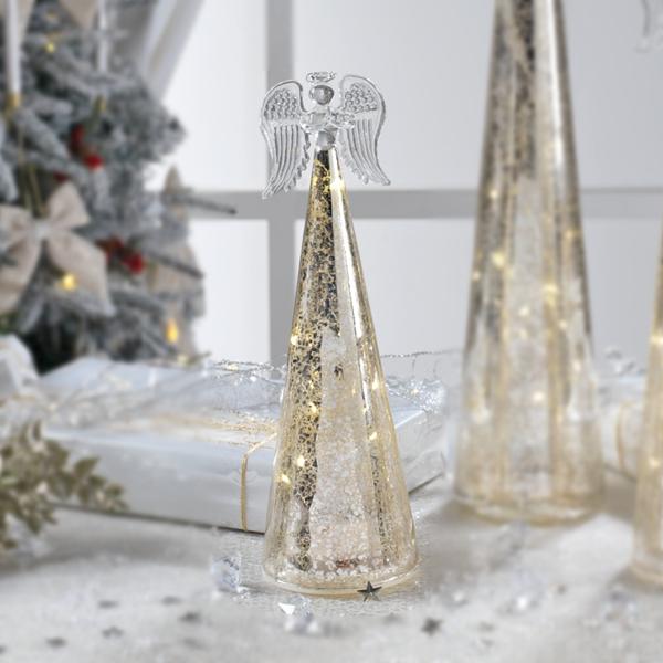 Acest înger decorativ din sticl&259; argintie adaug&259; un accent festiv &537;i elegant în orice decor de s&259;rb&259;tori Cu lumini LED integrate îngerul str&259;luce&537;te delicat eviden&539;iind frumuse&539;ea detaliilor &537;i creând o atmosfer&259; cald&259; &537;i primitoare Designul s&259;u rafinat 