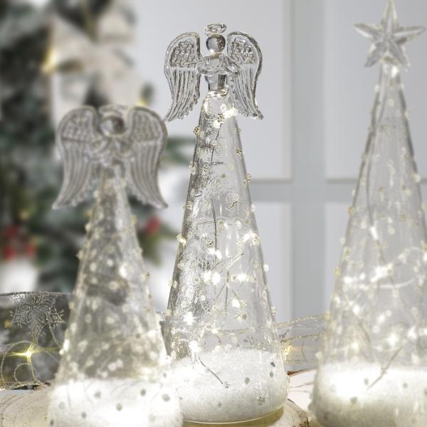 Completeaz&259; decorul festiv sau interiorul casei tale cu acest înger rafinat realizat din sticl&259; elegant&259; &537;i iluminat cu LED-uri care aduce o atmosfer&259; cald&259; &351;i primitoare Modelul are dimensiunile de 85 × 24 cmMaterialul sticlei confer&259; produsului un efect translucid subtil &537;i sofisticat iar iluminarea LED 