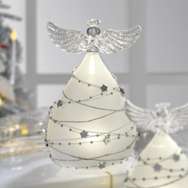 Adaug&259; o not&259; subtil&259; &351;i luminoas&259; decorului t&259;u de s&259;rb&259;tori cu acest înger elegant din sticl&259; satinat&259; Fiecare detaliu este gândit pentru a transmite delicate&355;e &351;i rafinament silueta îngerului este conturat&259; cu forme fine iar lumina LED integrat&259; creeaz&259; un efect blând captând privirile &351;i aducând o atmosfer&259; cald&259; în 