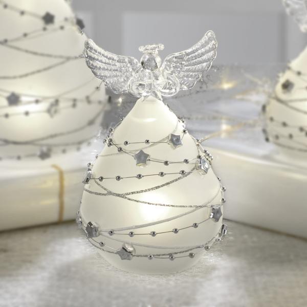 Adaug&259; o not&259; subtil&259; &351;i luminoas&259; decorului t&259;u de s&259;rb&259;tori cu acest înger elegant din sticl&259; satinat&259; Fiecare detaliu este gândit pentru a transmite delicate&355;e &351;i rafinament silueta îngerului este conturat&259; cu forme fine iar lumina LED integrat&259; creeaz&259; un efect blând captând privirile &351;i aducând o atmosfer&259; cald&259; în 