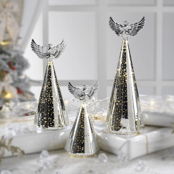 Acest înger decorativ din sticl&259; combin&259; elegan&539;a cu subtilitatea luminii fiind perfect pentru a ad&259;uga un accent festiv sau rafinat în orice col&539; al casei Partea superioar&259; transparent&259; reflect&259; delicat lumina iar partea inferioar&259; argintiu 