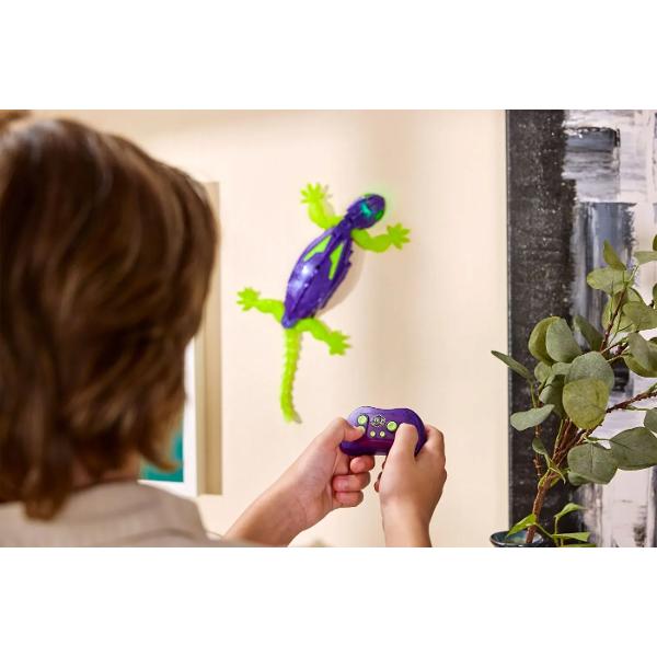 Descopera fascinanta soparla robotica Hexbots cataratoare Gecko mov o jucarie spectaculoasa care poate urca pe pereti si straluceste in intuneric Cu un design futurist in culori vibrante violet si verde fosforescent Gecko este usor de controlat cu telecomanda inclusa si aduce ore intregi de distractie pentru copii Tehnologia sa inovatoare ii permite sa se catere pe suprafete netede creand un efect uimitor de levitatie Perfecta pentru micii exploratori curiosi de stiinta si miscare 