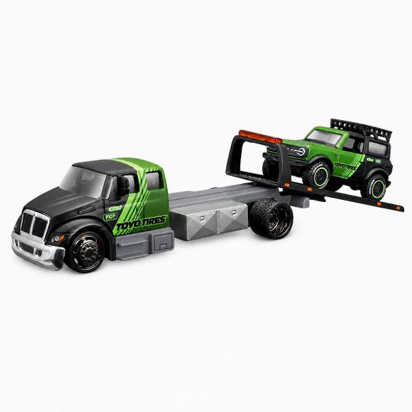 Set Elite Transport Camion Transportator si Masinuta Metalica scara 1 la 64 conceput pentru colectionari si pasionatii de vehicule clasice dar si pentru copii care apreciaza jocul realist Include un camion de tractare si un autoturism ambele realizate din metal cu elemente din plastic pentru un echilibru optim intre rezistenta si detaliu Modelul impresioneaza prin finisaje atent realizate detalii autentice si elemente functionale care reproduc fidel scenarii reale de transport si 