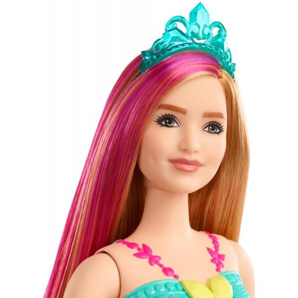 Papusile printesa de la Barbie Dreamtopia aduc visuri de basm in aspect fantastic cu atingeri colorateAceasta papusa printesa Barbie este imbracata pentru o ocazie regala intr-un corset albastru stralucitor si fusta vibranta cu imprimeu curcubeu O dunga roz in parul ei blond adauga un strop de culoare iar o tiara stralucitoare isi completeaza aspectul fantasticEste usor sa joci visuri reale si imaginate cu papusa printesei Barbie deoarece cand intri in Dreamtopia te trezesti intr-o 