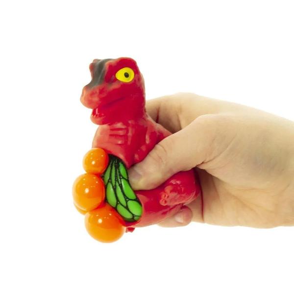 Dino Meshables este o jucarie senzoriala distractiva in forma de dinozaur potrivita pentru copiii pasionati de animale preistorice si joaca tactila Jucaria este moale si poate fi stransa in mana iar interiorul iese prin plasa sub forma unor bule colorate oferind un efect vizual amuzant si o experienta placuta la atingere Este ideala pentru relaxare joaca antistres stimularea simturilor si dezvoltarea coordonarii mana-ochiDisponibila in mai multe culori se vinde la bucata in 