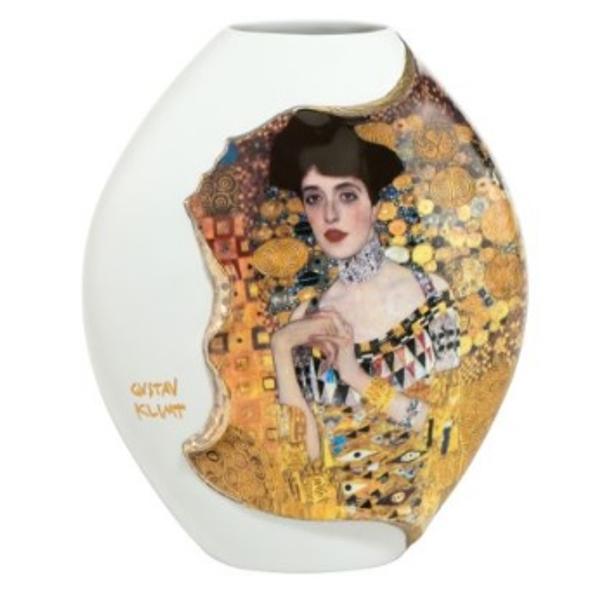 Vaz&259; por&539;elan alb &icirc;n&259;l&539;ime 20 cmFabricata din por&539;elan de &icirc;nalt&259; calitateCu decora&539;iuni somptuoase din aur realProiectata cu mare dragoste pentru detaliiLucrata manual cu m&259;iestrieObiect unic de colec&539;ie