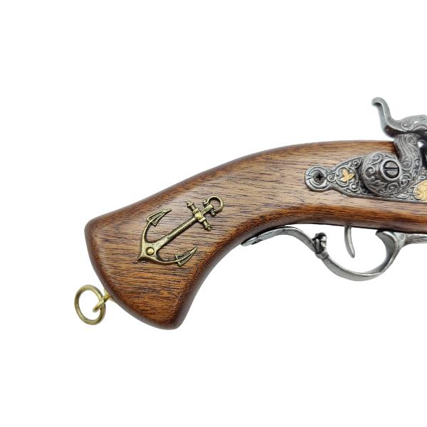 Pistol francez – replic&259; sec XVIIIReplic&259; decorativ&259; inspirat&259; de armele franceze din secolul al XVIII-lea perioad&259; marcat&259; de elegan&539;&259; artistic&259; &537;i rafinament în realizarea armelorPiesa este realizat&259; din lemn &537;i metal brunat având mecanism pe 