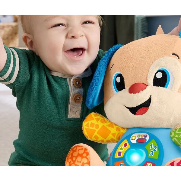 Catelusul interactiv Fisher-PriceRade si Invata este jucaria ideala pentru bebelusi combinand distractia cu invatarea prin joaca Cu peste 80 de cantece sunete si expresii amuzante catelusul ii ajuta pe cei mici sa descopere primele cuvinte culori litere numere si forme Textura moale si designul prietenos il transforma intr-un companion perfect pentru imbratisari si explorare zilnica Functia Smart Stages permite ajustarea nivelului de invatare in functie de varsta copilului de la 6 