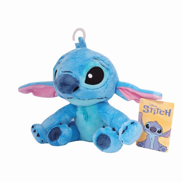 Plus Disney Stitch 20 cm este o jucarie moale si simpatica inspirata din celebrul personaj din universul Lilo si Stitch Realizat din materiale textile fine si placute la atingere acest plus reda fidel trasaturile lui Stitch cu ochi mari expresivi urechi late si detalii brodate atent finisate Dimensiunea de 20 cm il face potrivit pentru imbratisari joaca zilnica sau pentru a fi asezat ca element decorativ in camera copilului Este usor de transport ideal pentru calatorii sau pentru 