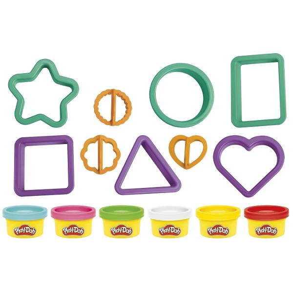Setul Play-Doh Forme este ideal pentru primele activitati creative cu plastilina oferind copiilor posibilitatea de a modela presa si decupa diferite forme intr-un mod distractiv Setul include forme geometrice si accesorii de modelaj precum si plastilina Play-Doh in 6 culori cu o cantitate totala de 170 g Joaca ajuta la dezvoltarea creativitatii coordonarii mana-ochi si motricitatii fine incurajand copiii sa combine culorile si sa creeze propriile modele Recomandat copiilor cu varsta de 