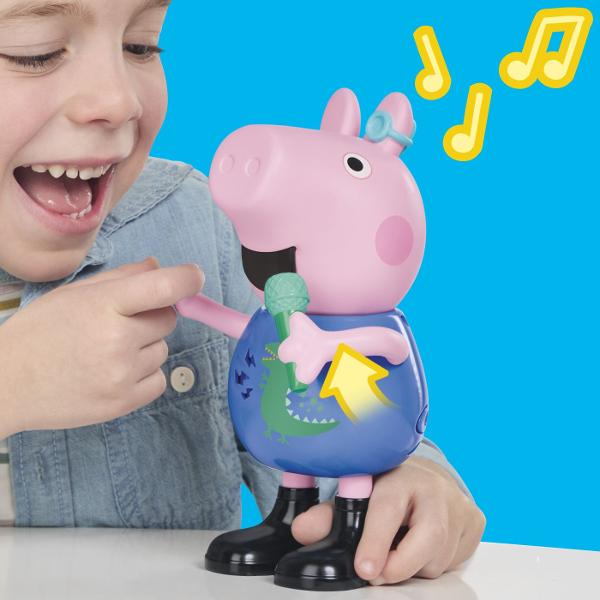 Descopera distractia muzicala alaturi de George indragitul personaj din seria Peppa Pig Figurina interactiva include peste 50 de sunete melodii si reactii amuzante Copiii pot apropia microfonul de gura figurinei pentru a-l auzi cantand pot apasa pe burta pentru a activa sunete si replici sau pot misca figurina pentru a descoperi diferite reactii Jucaria incurajeaza jocul de rol imaginatia si exprimarea muzicala fiind potrivita pentru micii fani Peppa Pig George tine in mana un microfon 