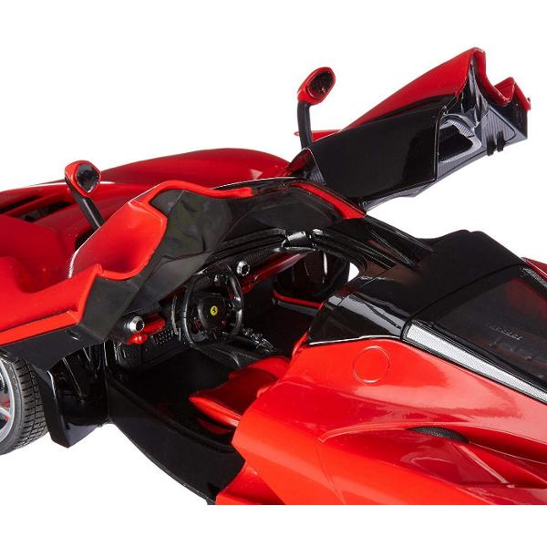 Copilul dumneavoastra se poate juca in voie cu masina cu telecomanda Ferrari LaFerrari scara 1 la 14 oferita de brandul international Rastar Nicio cursa nu este imposibil de castigat cu acesta masinuta replica oficiala cu licenta a modelului original construita cu mare atentie la detalii Masinuta are proportiile ideale pentru momente pline de distractie si amuzament avand dimensiunile in centimetri dupa cum urmeaza  335147108Masinuta functioneaza pe frecventa de 24GAlimentarea se 