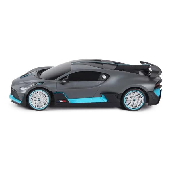 Copilul dumneavoastra se poate juca in voie cu masina cu telecomanda Bugatti Divo scara 1 la 24 oferita de brandul international Rastar Nicio cursa nu este imposibil de castigat cu acesta masinuta replica oficiala cu licenta a modelului original construita cu mare atentie la detalii Masinuta are proportiile ideale pentru momente pline de distractie si amuzament avand dimensiunile in centimetri dupa cum urmeaza  178683Masinuta functioneaza pe frecventa de 24GAlimentarea se face 