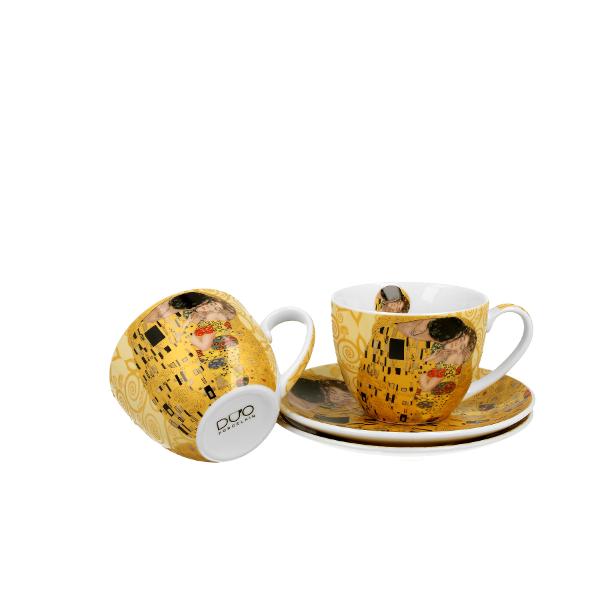 Set cu dou&259; ce&537;ti cu farfurioare THE KISS ECRU de 270 ml   inspirate de Gustav Klimt parte a seriei Art Gallery  realizate din por&539;elan de calitate superioar&259; caracterizat printr-o culoare alb-crem elegant&259; &537;i natural&259; cu o str&259;lucire delicat&259; precum &537;i o durabilitate excep&539;ional&259;Setul este decorat cu o reproducere a 