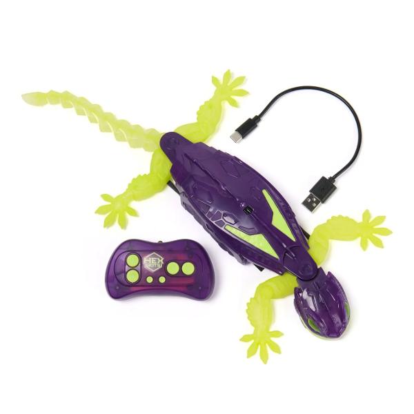 Descopera fascinanta soparla robotica Hexbots cataratoare Gecko mov o jucarie spectaculoasa care poate urca pe pereti si straluceste in intuneric Cu un design futurist in culori vibrante violet si verde fosforescent Gecko este usor de controlat cu telecomanda inclusa si aduce ore intregi de distractie pentru copii Tehnologia sa inovatoare ii permite sa se catere pe suprafete netede creand un efect uimitor de levitatie Perfecta pentru micii exploratori curiosi de stiinta si miscare 