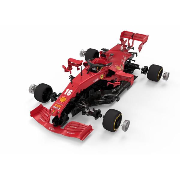 Kitul de Asamblare RC FERRARI SF1000 de la Rastar este o jucarie spectaculoasa ideala pentru copiii care iubesc sa construiasca si sa se joace cu masinute controlate prin telecomanda Acest set DIY include 65 de piese din plastic care permit asamblarea unei replici detaliate a masinii FERRARI SF1000 la scara 116 Dupa ce este asamblata masinuta devine complet functionala si poate fi controlata printr-o telecomanda moderna cu frecventa de 24 GHz ce ofera un control precis si stabil fara 