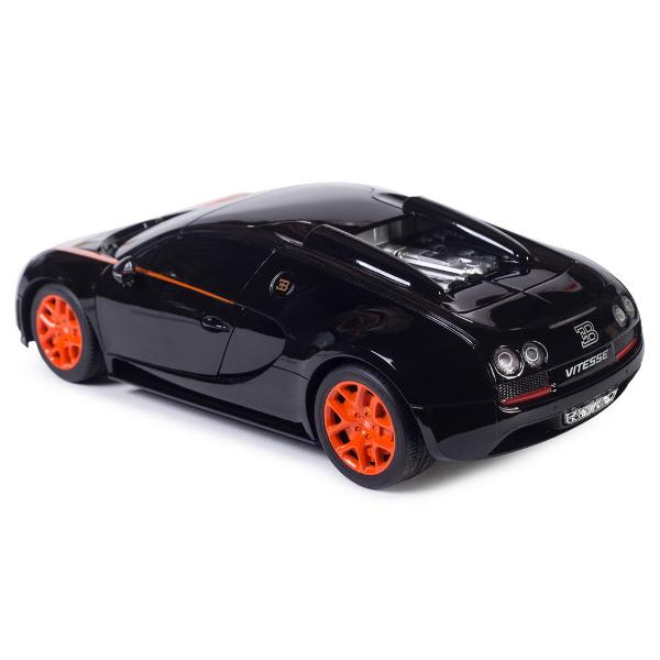 Copilul dumneavoastra se poate juca in voie cu masina cu telecomanda Bugatti Grand Sport Vitesse scara 1 la 18 oferita de brandul international Rastar Nicio cursa nu este imposibil de castigat cu acesta masinuta replica oficiala cu licenta a modelului original construita cu mare atentie la detalii Masinuta are proportiile ideale pentru momente pline de distractie si amuzament avand dimensiunile in centimetri dupa cum urmeaza  2481268Masinuta functioneaza pe frecventa de 