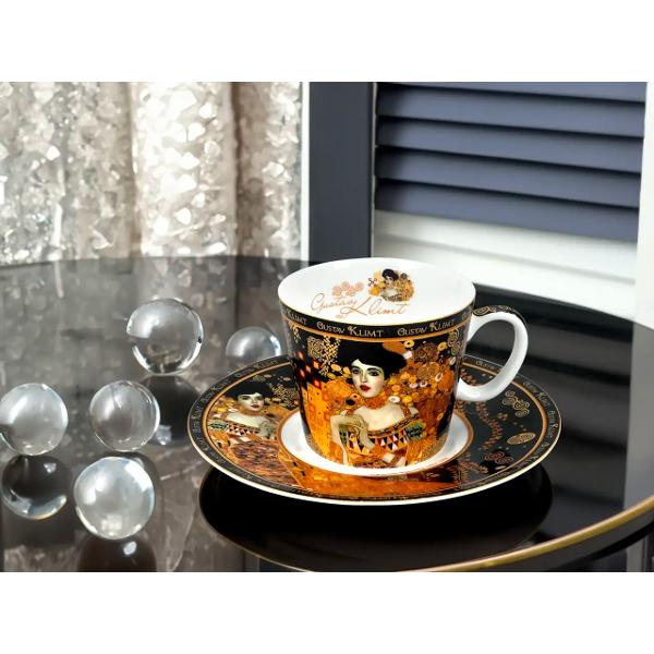 Savureaza espresso-ul cu stil cu aceasta ceasca din portelan fin inspirata din celebrul tablou &bdquo;Adele&rdquo; al lui Gustav Klimt Designul elegant si artistic transforma fiecare moment de cafea intr-o experienta vizuala si gustativa deosebitaMaterial premium&nbsp;Portelan de inalta 