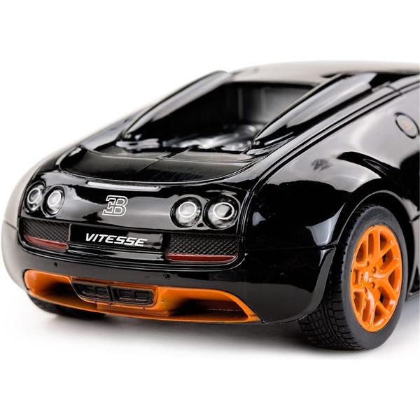 Copilul dumneavoastra se poate juca in voie cu masina cu telecomanda Bugatti Grand Sport Vitesse scara 1 la 18 oferita de brandul international Rastar Nicio cursa nu este imposibil de castigat cu acesta masinuta replica oficiala cu licenta a modelului original construita cu mare atentie la detalii Masinuta are proportiile ideale pentru momente pline de distractie si amuzament avand dimensiunile in centimetri dupa cum urmeaza  2481268Masinuta functioneaza pe frecventa de 