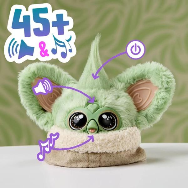 Jucarie interactiva tip Furblets Grogu compacta si usor de transport conceputa pentru distractie rapida si interactiune muzicala Produsul reda peste 45 de sunete si efecte audio oferind o experienta dinamica prin activarea diferitelor functii tactile Designul colorat si expresiv atrage atentia iar dimensiunea redusa permite utilizarea oriunde acasa sau in deplasare Este realizat din materiale rezistente potrivite pentru utilizare frecventa Produsul functioneaza pe baza de baterie tip 