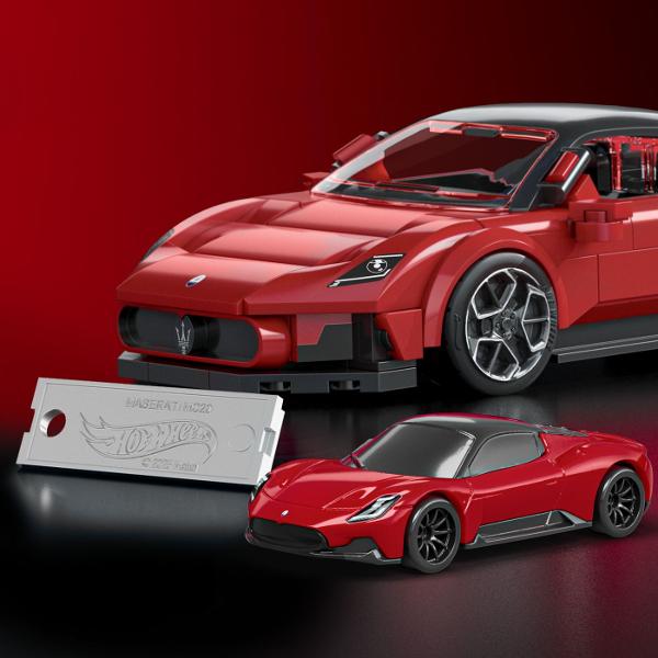 Setul HOT WHEELS MASERATI MC20 aduce impreuna eleganta legendarei marci Maserati si creativitatea constructiei cu piese oferind o experienta premium pentru pasionatii de supercaruri si colectionarii Hot Wheels Pachetul include o masina metalica exclusiva MC20 insotita de o placa semnatura precum si un set de constructie format din 250 de piese cu ajutorul carora poti construi un model impresionant al celebrului supercar italian Designul rafinat liniile aerodinamice si detaliile realiste 