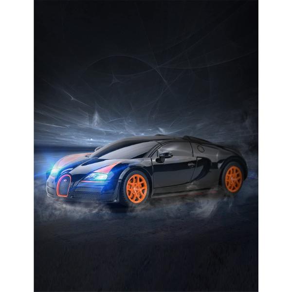 Copilul dumneavoastra se poate juca in voie cu masina cu telecomanda Bugatti Grand Sport Vitesse scara 1 la 18 oferita de brandul international Rastar Nicio cursa nu este imposibil de castigat cu acesta masinuta replica oficiala cu licenta a modelului original construita cu mare atentie la detalii Masinuta are proportiile ideale pentru momente pline de distractie si amuzament avand dimensiunile in centimetri dupa cum urmeaza  2481268Masinuta functioneaza pe frecventa de 