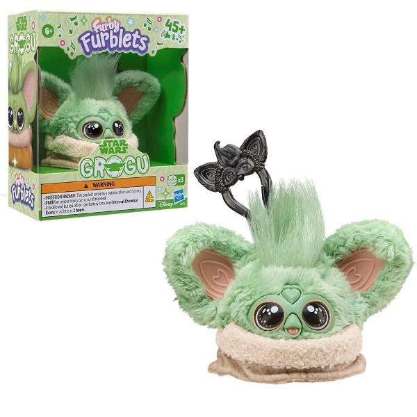 Jucarie interactiva tip Furblets Grogu compacta si usor de transport conceputa pentru distractie rapida si interactiune muzicala Produsul reda peste 45 de sunete si efecte audio oferind o experienta dinamica prin activarea diferitelor functii tactile Designul colorat si expresiv atrage atentia iar dimensiunea redusa permite utilizarea oriunde acasa sau in deplasare Este realizat din materiale rezistente potrivite pentru utilizare frecventa Produsul functioneaza pe baza de baterie tip 