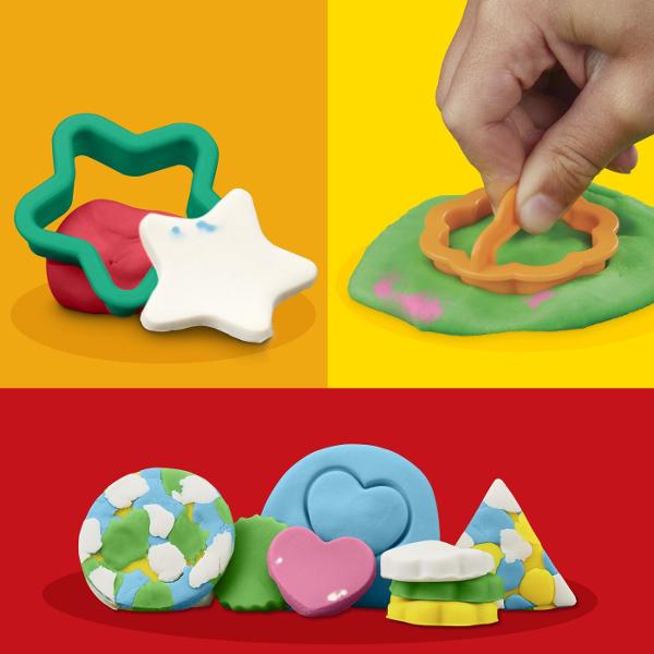 Setul Play-Doh Forme este ideal pentru primele activitati creative cu plastilina oferind copiilor posibilitatea de a modela presa si decupa diferite forme intr-un mod distractiv Setul include forme geometrice si accesorii de modelaj precum si plastilina Play-Doh in 6 culori cu o cantitate totala de 170 g Joaca ajuta la dezvoltarea creativitatii coordonarii mana-ochi si motricitatii fine incurajand copiii sa combine culorile si sa creeze propriile modele Recomandat copiilor cu varsta de 