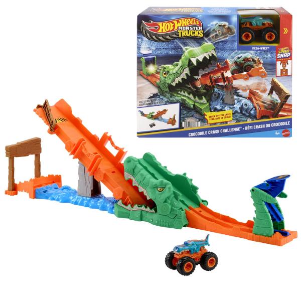 Pregateste-te pentru actiune la scara mare cu setul Hot Wheels Monster Trucks Provocarea Crocodilului cu masinuta inclusa o provocare spectaculoasa plina de viteza si impact Arena este dominata de un crocodil urias cu falci deschise gata sa prinda camionul Monster Truck in timpul cursei Copilul lanseaza vehiculul pe rampa tintind direct spre tinta pentru a dobori obstacolul si a invinge crocodilul Setul include un Monster Truck Mega Wrex realizat in stil robust cu roti supradimensionate 